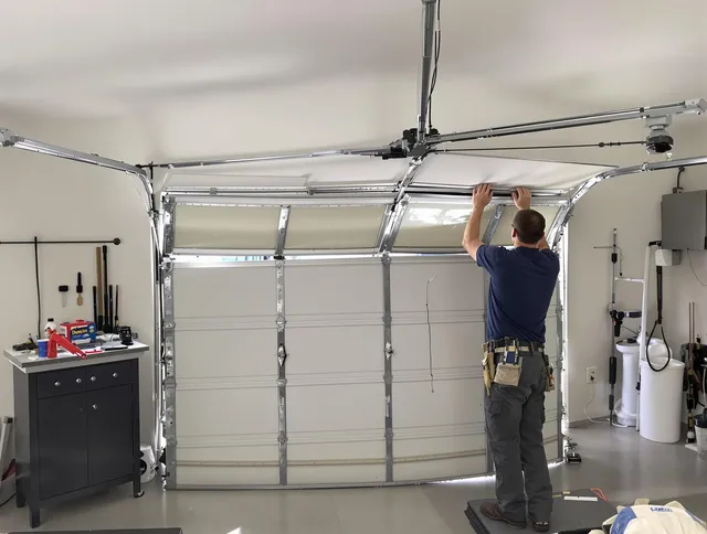 Beachwood Garage Door Repair specialist performing precise section replacement on Beachwood garage door