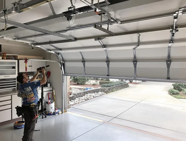 Garage door track repair service by Beachwood Garage Door Repair in Beachwood